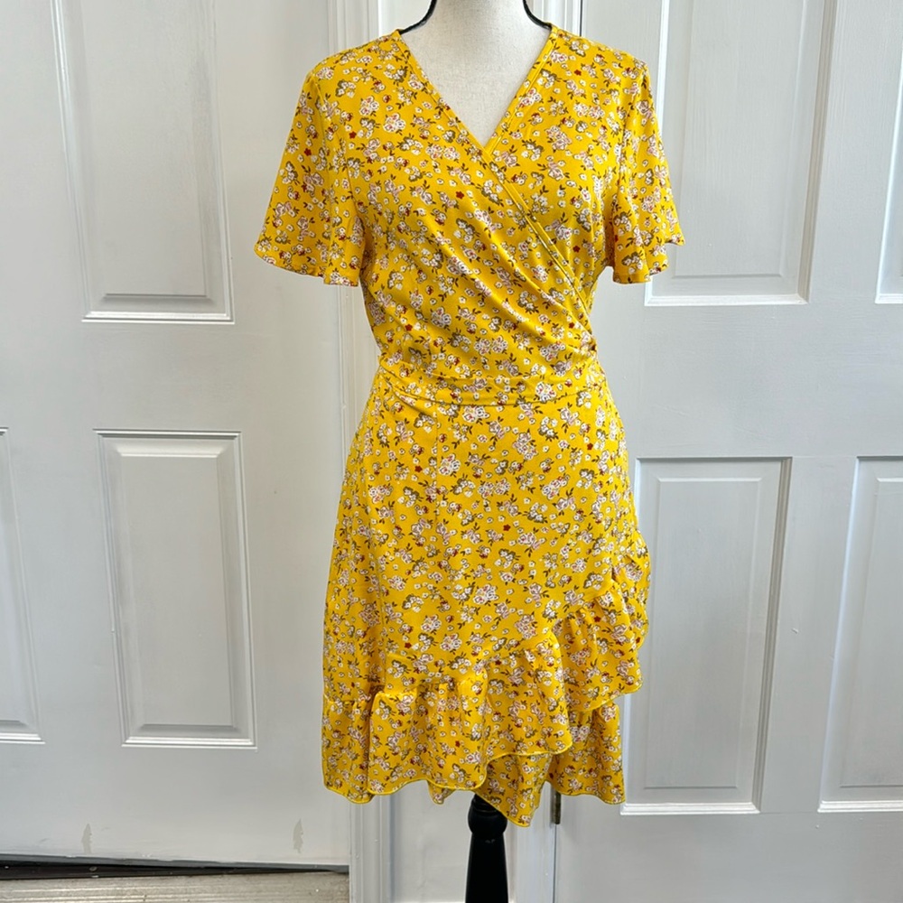 Nagoo Ruffle mini wrap dress in yellow floral sz Medium
